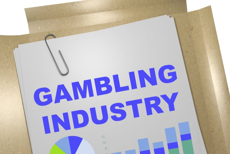 3D illustration of "GAMBLING INDUSTRY" title on business document