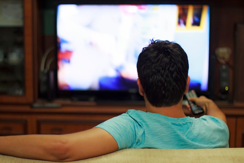 Guy watching TV