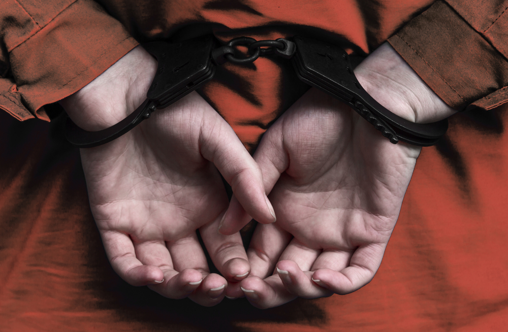 female hands in handcuffs