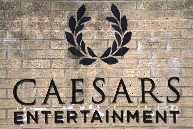 Caesars Entertainment logo on wall